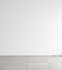 Fototapeta premium Clean white brick wall, subtly textured stone tile surface, wall, home, tile texture