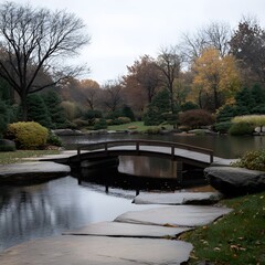 Fototapeta premium Autumnal Japanese garden bridge, tranquil pond, misty background; serene landscape design