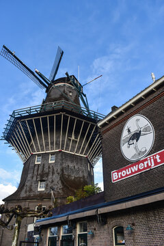 Amsterdam NETHERLANDS - 28 November 2017 - De Gooyer Windwill next to the building of Brouwerij 't IJ brewery