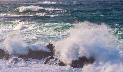 Big powerful storm waves in Porto Moniz, on the Madeira Atlantic coastline