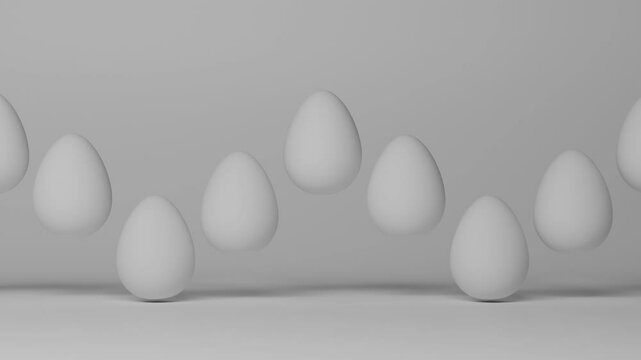 Looping 3d animation of a row of white eggs that move vertically creating a wave motion. Abstract animation, the idea of nutrition, Easter holidays and diet.
