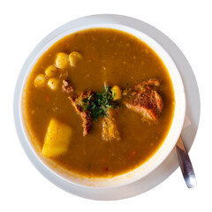 Sancocho - thick soup with pieces of veal, traditional for Latin American countries. Dominican cuisine. Isolated over white background