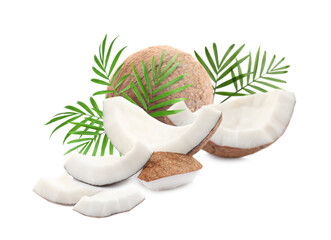 Fresh coconuts and green palm leaves isolated on white