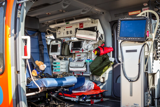 Interior view of a Airbus H145 LUH rescue helicopter with medical emergency equipment.