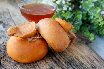 Collection of cheeses, rennet cheese smoked suluguni made from cow's milk in the Caucasus in Dagestan and Ossetia, yellow smoked cheese