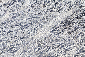 A breathtaking view of Pamukkale, Turkey, known for its stunning white terraces formed by mineral-rich thermal waters.