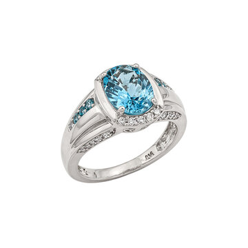 An exquisite white gold ring with an oval topaz center and sparkling diamonds on the band Effortlessly elegant