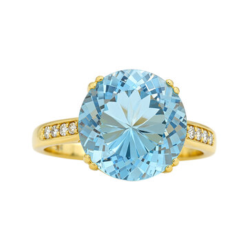 Exquisite gold ring with blue topaz center stone and diamond accents radiating elegance and charm