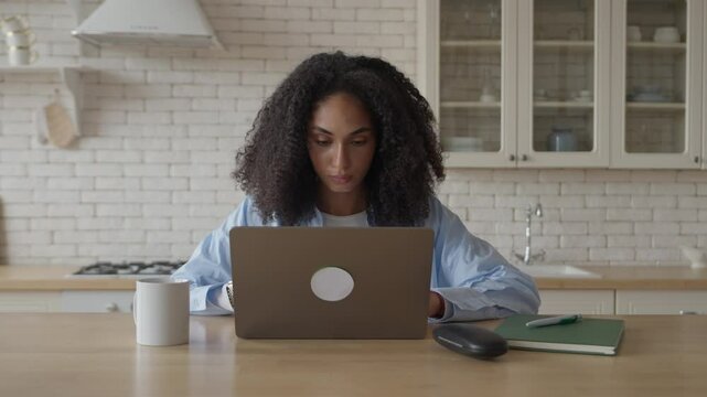 Serious Woman Reviewing Documents On Laptop, Thinking Deeply, Solving Tasks