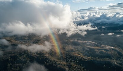 Obraz premium Aerial Rainbow over Autumn Hills.