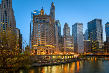 View of Chicago Loop skyline and river at twilight