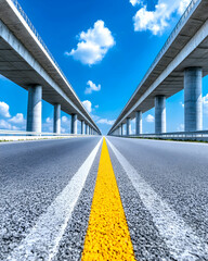 Fototapeta premium Highway Underpass, Empty Road, Sunny Day, Transportation, Perspective View, Wide Road, Modern Infrastructure, Blue Sky