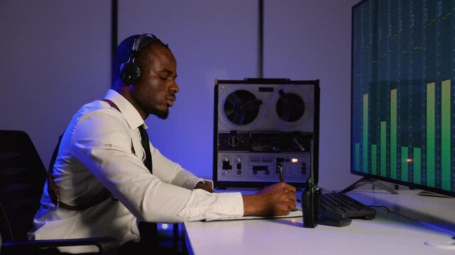 Intelligence officer conducting wiretap and analysis