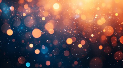 Abstract bokeh background with orange, blue, and gold lights.
