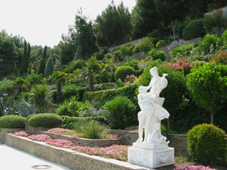 Fototapeta na wymiar Marble antique sculpture, landscape gardening