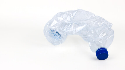 Crumpled plastic bottle isolated - on white background
