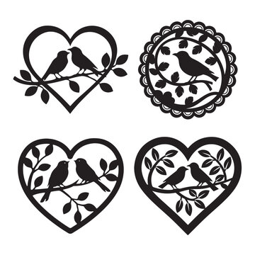 Black and white decorative heart shapes with birds, ideal for crafting projects.