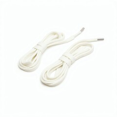 Two flexible white charging cables lying on a clean surface.