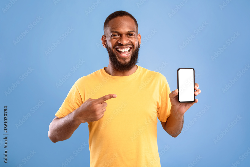 Poster check out this mobile app. excited african american man presenting smartphone with blank screen, off