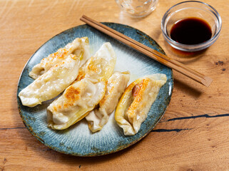 Delicious japanese gyoza dumplings stuffed with pork served on plate
