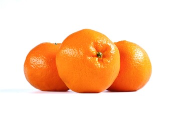 Still life photography of orange, shoot in studio on white background, stacking focus and free space for text. fruit for background concept.