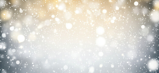 Obraz premium Sparkling bokeh lights on a silver and gold background.