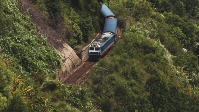 Train passes on coastal route, Hai Van Pass, Vietnam