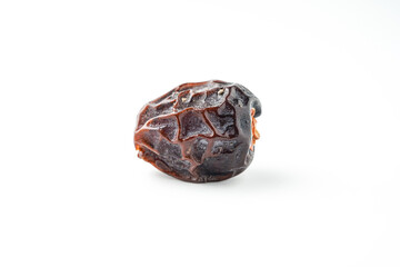 Dates fruit ajwa or kurma ajwa, isolated on white background