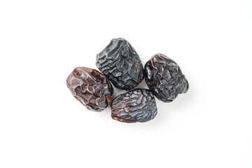Dates fruit ajwa or kurma ajwa, isolated on white background