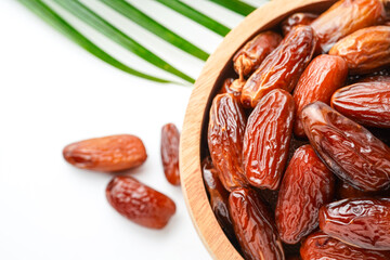 Dates fruit tunisia, Tunisian honey dates, in bowl isolated on white background