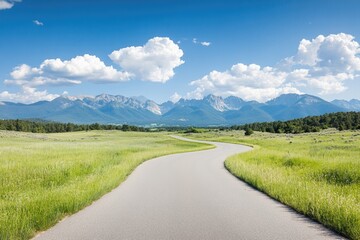 Naklejka premium scenic open road meandering through vast untouched landscapes beneath expansive sky offering copy space to right capture