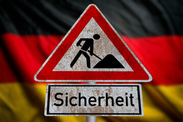 Deutsche Flagge und Verkehrsschild Baustelle Sicherheit