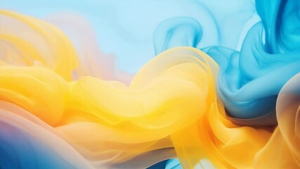 Abstract flowing background with yellow and blue smoke. Smooth fluid motion graphics animation. Colorful ink blending effect, ethereal and calming visualizer backdrop