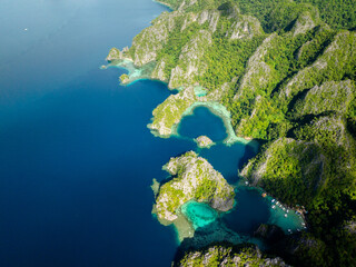 Blue sea and Lagoons with boats. Coron, Palawan. Philippines.