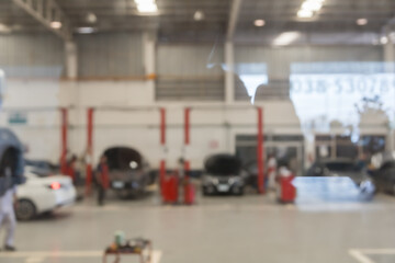 blured image of car service centre auto repair workshop