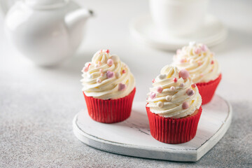 Red velvet cupcakes with whipped cream for Holidays