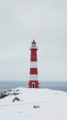 Striped Lighthouse in Winter Silence