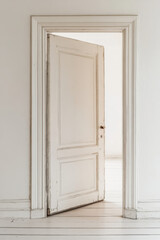 Open white door
