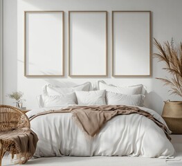 Minimalist bedroom interior with three empty frames, bed, and wicker chair.