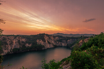 Wide-angle nature background of the morning atmosphere before sunrise. There are many trees growing...