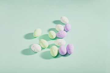 Easter eggs dotted on a blue background