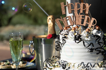 Happy New Year cake and bubbles party display