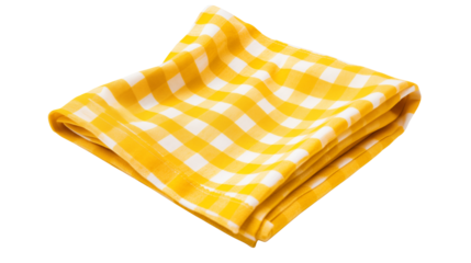 Folded yellow and white checkered cloth on a black surface
