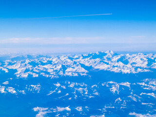 The Alps seen from an airplane window.