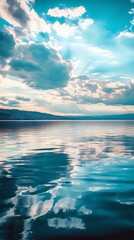 Obraz premium Calm lake reflecting a dramatic sky. Sunset over water. Possible use Stock photo