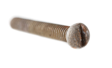 A screw with a round head is shown in a close up