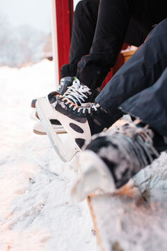 ice skates on the side of an ice rink in sweden
