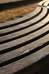 Old wooden curvy bench