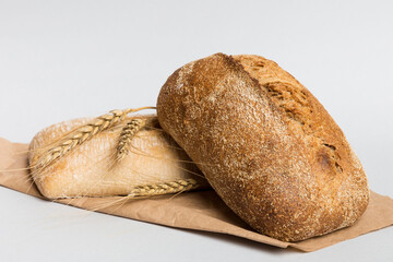 Homemade natural breads. Different kinds of fresh bread as background, perspective view with copy space