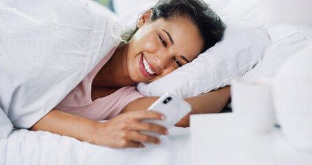 Laughing, morning or woman with phone in bed for dating website, funny joke or social media meme....